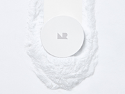 ProtoClinical k-beauty [NATURE REPUBLIC] No-Sebum Finish Powder 4g as a soft blue rectangular powder case with a gray lower block centered on a light background
