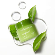 ProtoClinical k-beauty [NATURE REPUBLIC] Mild Green Tea Cream 55ml abstract coral bottle silhouette with pale blue side accents on a light background