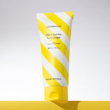 ProtoClinical k-beauty pale yellow beauty product silhouette with soft blue side accents on a light background.