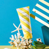ProtoClinical k-beauty blue-green beauty product detail with soft gold tones on a light background.