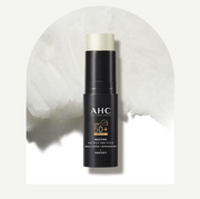 ProtoClinical k-beauty AHC Masters Air Rich Sun Stick SPF50+ PA++++ 10g single dark sun stick package centered on a white background with soft gray side shadows.