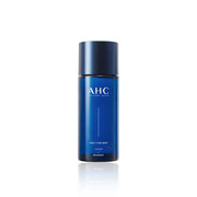 ProtoClinical k-beauty AHC Only For Men Toner 150ml single upright blue toner bottle centered on a white background with soft peach side accents