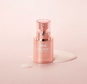 ProtoClinical k-beauty AHC Aura Secret Tone Up Cream SPF30 PA++ 50g single upright beige cream package centered on a soft pink background.
