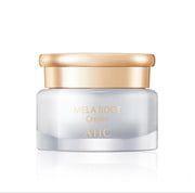 ProtoClinical k-beauty AHC H Mela Root Cream 50ml single cream jar in pale yellow and beige tones centered on a white background with soft lavender lower accents
