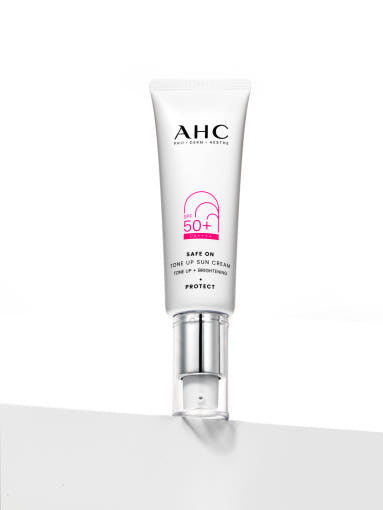 ProtoClinical k-beauty AHC Safe On Tone Up Sun Cream SPF50+ PA++++ 50ml single upright pale lavender sun cream package centered on a light background.