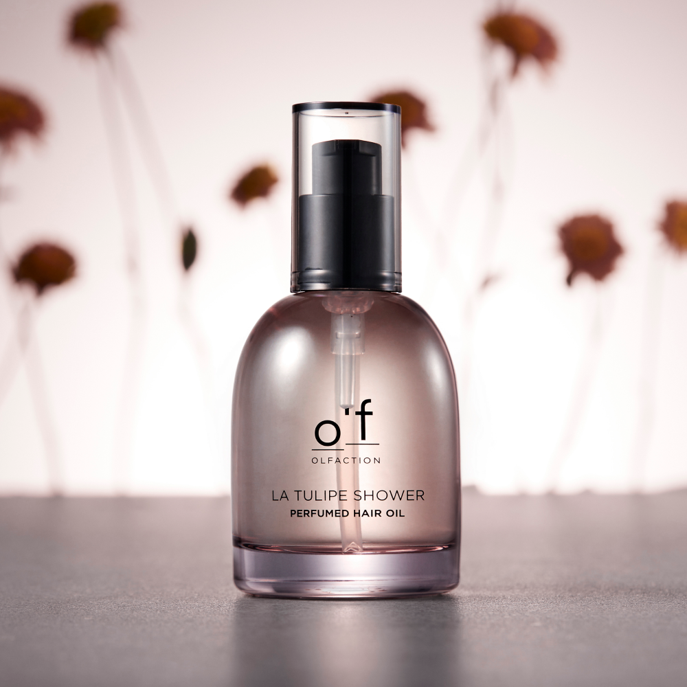 ProtoClinical k-beauty Kerasys Olfaction Perfume Hair Oil 70ml single dark hair oil bottle centered with bright cream side highlights on a light beige background
