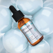 ProtoClinical k-beauty cool gray beauty product silhouette on a pale blue background.