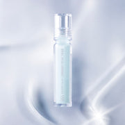 ProtoClinical k-beauty WELLAGE Real Hyaluronic Lip Plumper 3.8ml clear lip plumper bottle standing upright on a glossy pale blue background with soft light reflections