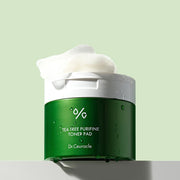ProtoClinical k-beauty soft green beauty graphic with a dark centered form fading into a pale background.