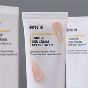 ProtoClinical k-beauty soft gray beauty graphic with muted lavender vertical bands on a pale background.