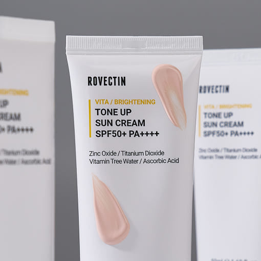 ProtoClinical k-beauty soft gray beauty graphic with muted lavender vertical bands on a pale background.