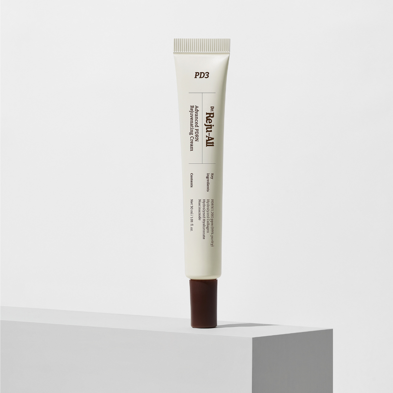 ProtoClinical k-beauty slim gray cosmetic bottle on a light background.