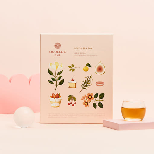 ProtoClinical k-beauty peach cosmetic packaging on a light background.