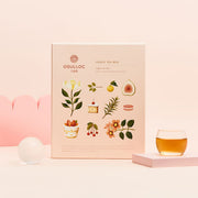 ProtoClinical k-beauty peach cosmetic packaging on a light background.