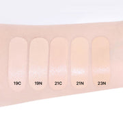 ProtoClinical k-beauty product packaging in cool gray tones on a light background.
