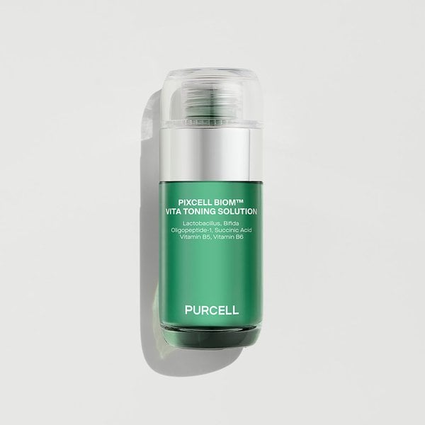 ProtoClinical k-beauty muted green beauty detail with a dark olive vertical center on a light pink background.
