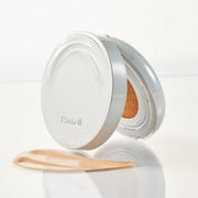 ProtoClinical k-beauty taupe beauty product silhouette centered on a soft cream background.