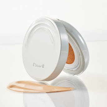 ProtoClinical k-beauty taupe beauty product silhouette centered on a soft cream background.