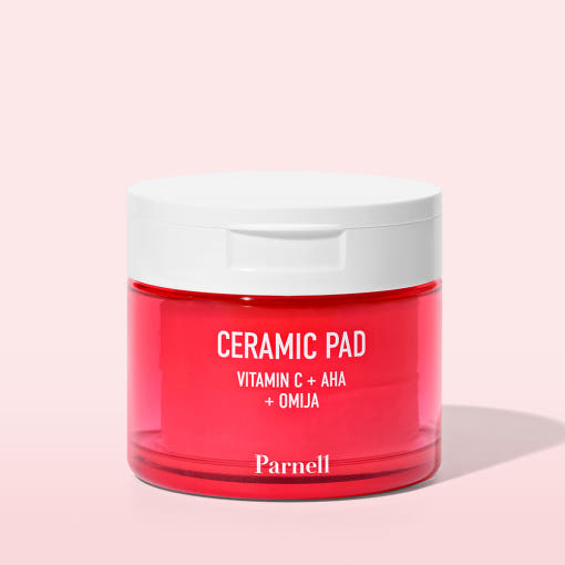 ProtoClinical k-beauty soft pink beauty bottle silhouette with a bright red lower band on a pale aqua background.