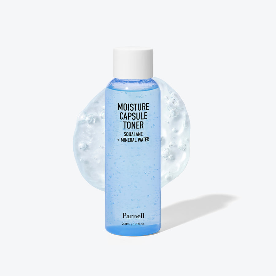 ProtoClinical k-beauty Parnell Squalane Mineral Water Moisture Capsule Toner 200ml translucent blue toner bottle standing upright in front of a clear water capsule shape on a pale cream background
