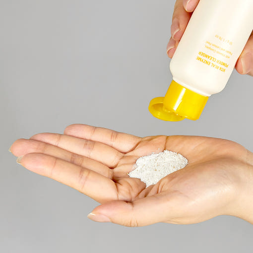 ProtoClinical k-beauty blue beauty graphic with soft beige and yellow accents on a light background.