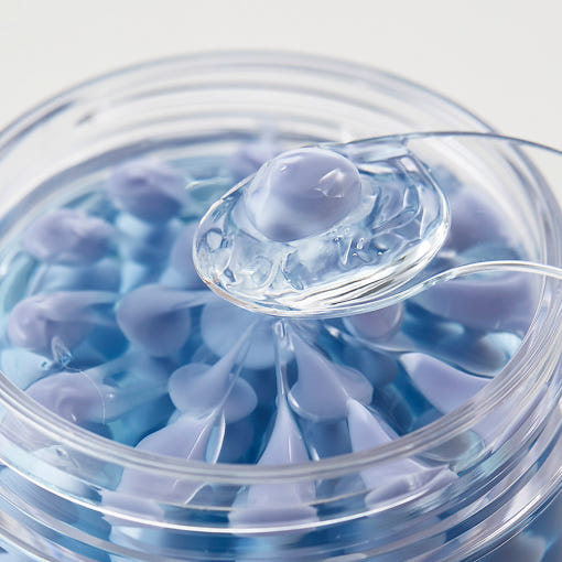 ProtoClinical k-beauty blue beauty graphic with a muted yellow center on a light background.