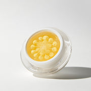 ProtoClinical k-beauty blue beauty graphic with a soft yellow center on a light background.