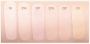 ProtoClinical k-beauty warm beige beauty packaging detail on a light neutral background.