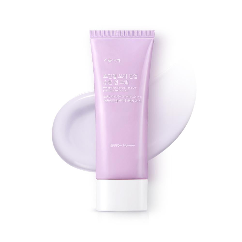 ProtoClinical k-beauty Shingmulnara White Rice Purple Tone Up Moisture Sun Cream SPF50+ PA++++ 100ml single upright pale lavender sun cream tube on a light background.