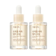 ProtoClinical k-beauty Shingmulnara Yuchae Flower Honey Watery Multi Oil 30ml+30ml shown as a single centered product packshot with warm amber and cream tones on a light background.