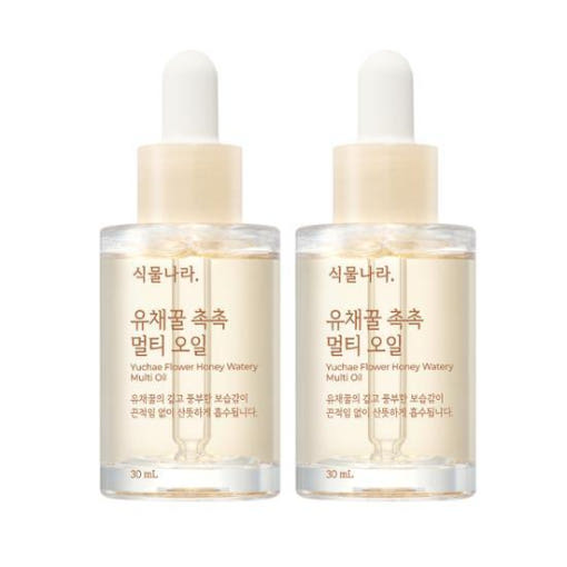 ProtoClinical k-beauty Shingmulnara Yuchae Flower Honey Watery Multi Oil 30ml+30ml shown as a single centered product packshot with warm amber and cream tones on a light background.