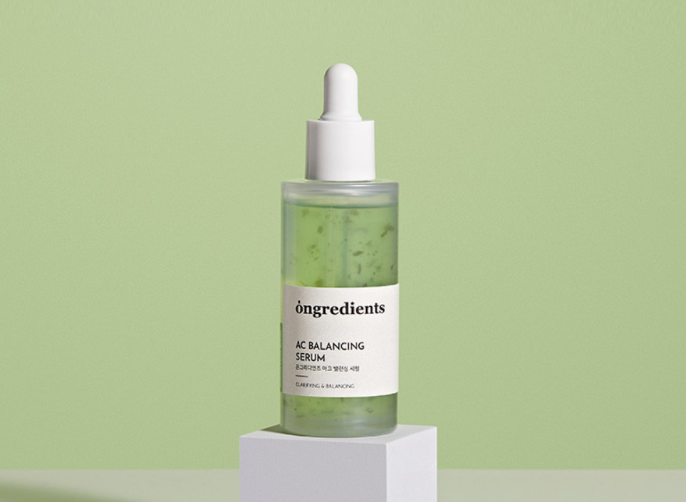 ProtoClinical k-beauty ongredients AC Balancing Serum 50ml as a single pale green serum bottle centered upright on a light green background