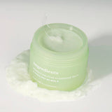 ProtoClinical k-beauty muted gray-green beauty graphic with a pale diagonal band and soft mauve corner tones.