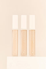 ProtoClinical k-beauty soft peach beauty product silhouette on a pale cream background.