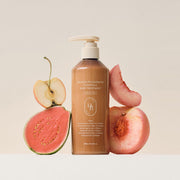 ProtoClinical k-beauty HEVEBLUE Salmon Pullkeratin Centella Hair Treatment 300ml single upright peach-orange bottle centered on a pale blue background.
