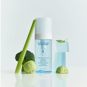 ProtoClinical k-beauty olive and aqua beauty packaging collage on a pale background.