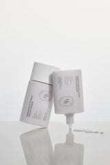 ProtoClinical k-beauty slim gray beauty product silhouette with a soft shadow on a light background.