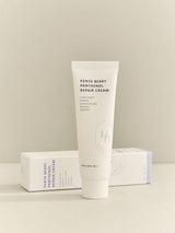 ProtoClinical k-beauty HEVEBLUE Penta Berry Panthenol Repair Cream 50ml shown as a single deep brown beauty compact centered on a pale gray and blush background