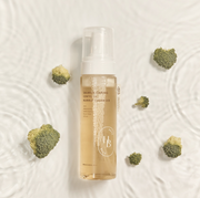 ProtoClinical k-beauty warm beige beauty graphic with a brown vertical center and soft gray side panels on a light background.