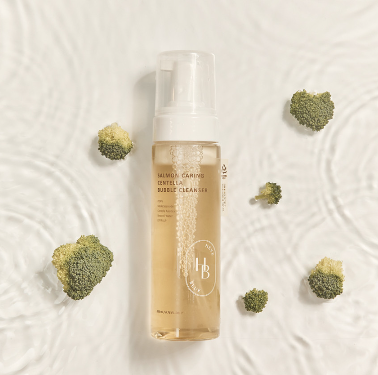 ProtoClinical k-beauty warm beige beauty graphic with a brown vertical center and soft gray side panels on a light background.