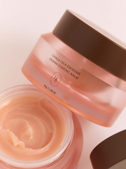 ProtoClinical k-beauty HEVEBLUE Chaga Cica Exosome Derma Coating Balm 55g close-up of a translucent pink balm jar with a brown lid beside an open jar showing cream on a pale background