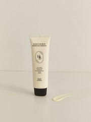 ProtoClinical k-beauty taupe beauty bottle silhouette with olive side accents on a light background.