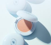 ProtoClinical k-beauty dark beauty bottle on a pale blue and white background.