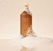 ProtoClinical k-beauty HEVEBLUE Salmon Pullkeratin Centella Hair Shampoo 500ml single warm brown shampoo bottle centered upright with pale peach side panels on a light background