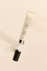 ProtoClinical k-beauty beauty product silhouette with a dark lower section and soft peach upper tones on a light background.