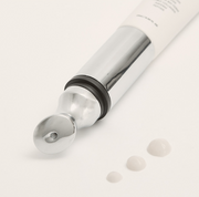 ProtoClinical k-beauty abstract beauty graphic with a soft diagonal taupe form on a pale cream background.
