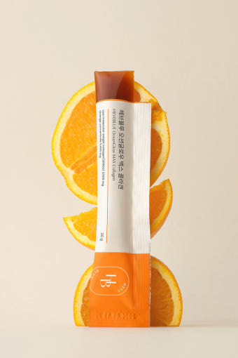 ProtoClinical k-beauty pale peach beauty product packaging with a soft vertical center on a light background.