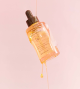 ProtoClinical k-beauty warm peach and beige beauty graphic with a soft vertical center on a light background.