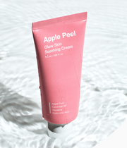 ProtoClinical k-beauty SUNGBOON EDITOR Apple Peel Glow Skin Soothing Cream 50ml in a pink squeeze tube with white lettering and water droplets, standing on a rippled water background