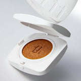 ProtoClinical k-beauty tfit Layering Fit Cover Cushion EX SPF50+ PA++++ 12g (5colors) open white cushion compact with a beige sponge insert and lid lifted above on a pale gray background